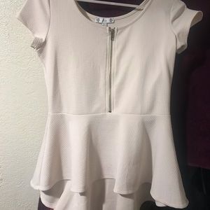 Cream colored top with zipper